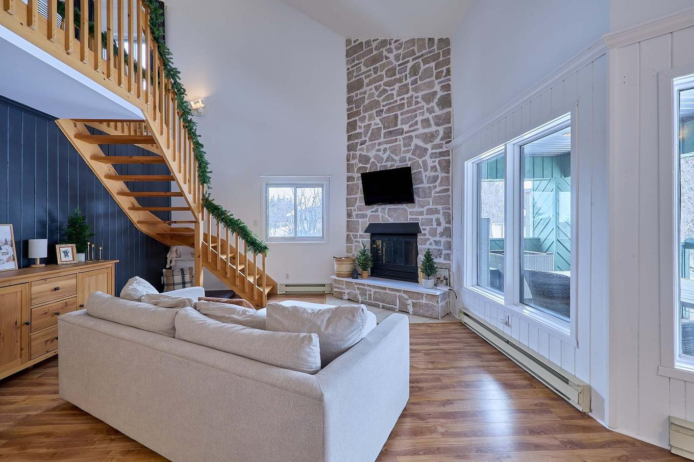 Salle familiale - F-735 Ch. Des Trois-Villages, Piedmont, QC - Indoor Photo Showing Living Room With Fireplace
