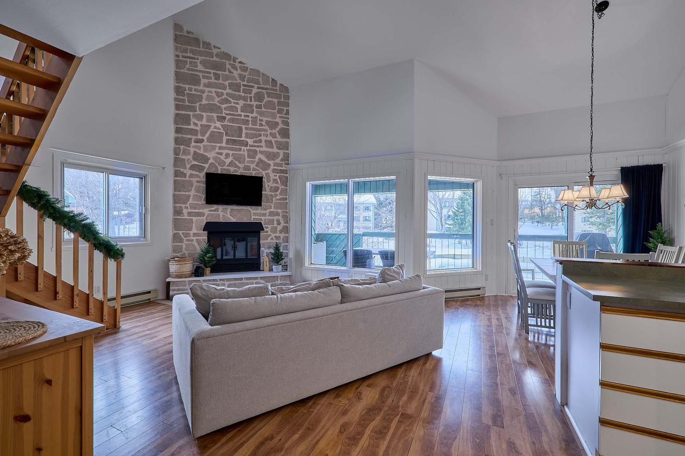 Salle familiale - F-735 Ch. Des Trois-Villages, Piedmont, QC - Indoor Photo Showing Living Room With Fireplace