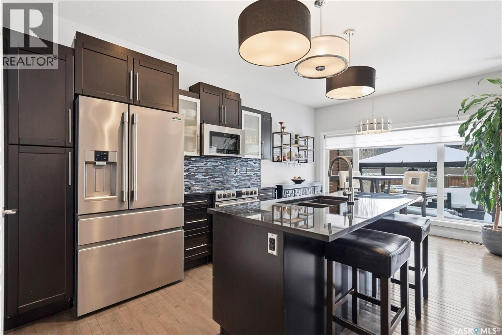 707 Sauer Crescent, Saskatoon, SK - Indoor Photo Showing Kitchen With Stainless Steel Kitchen With Upgraded Kitchen