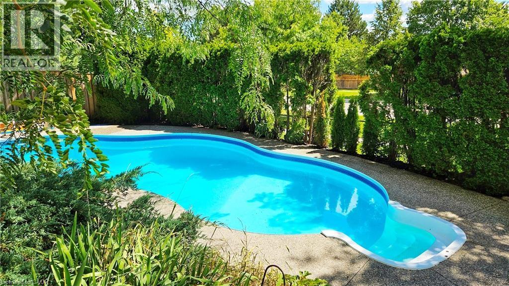 1320 Monmouth Drive, Burlington, ON - Outdoor With In Ground Pool With Backyard