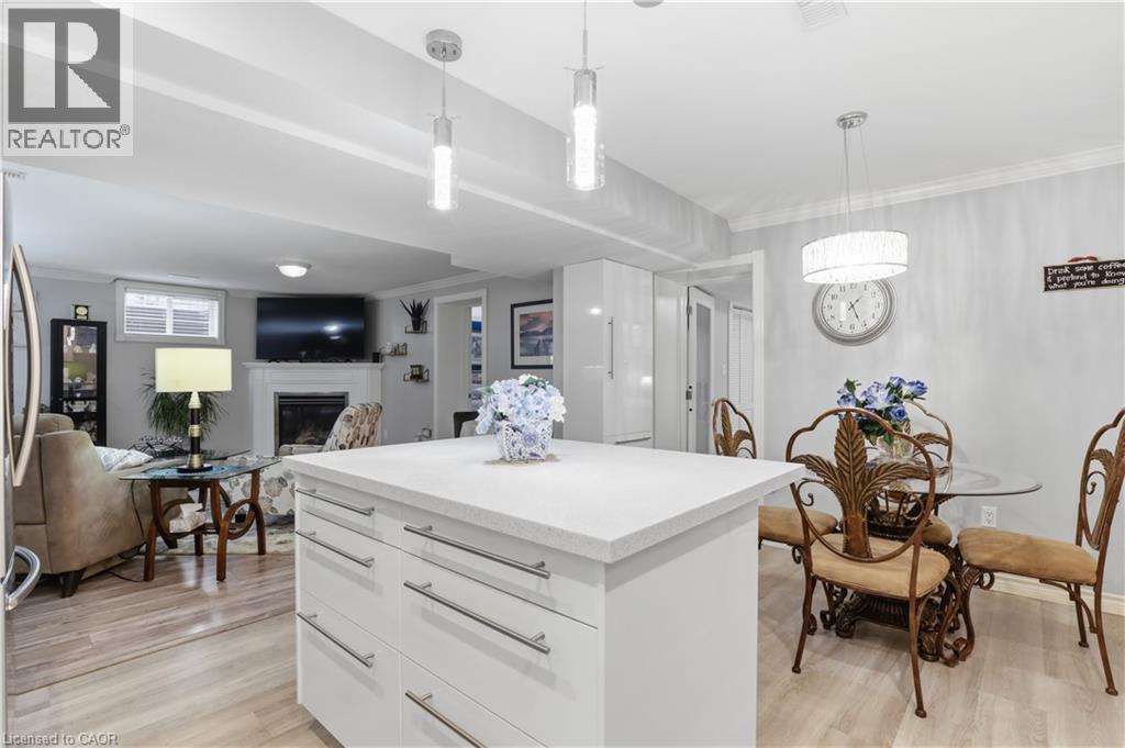 29 Chipman Avenue, Hamilton, ON - Indoor Photo Showing Dining Room With Fireplace