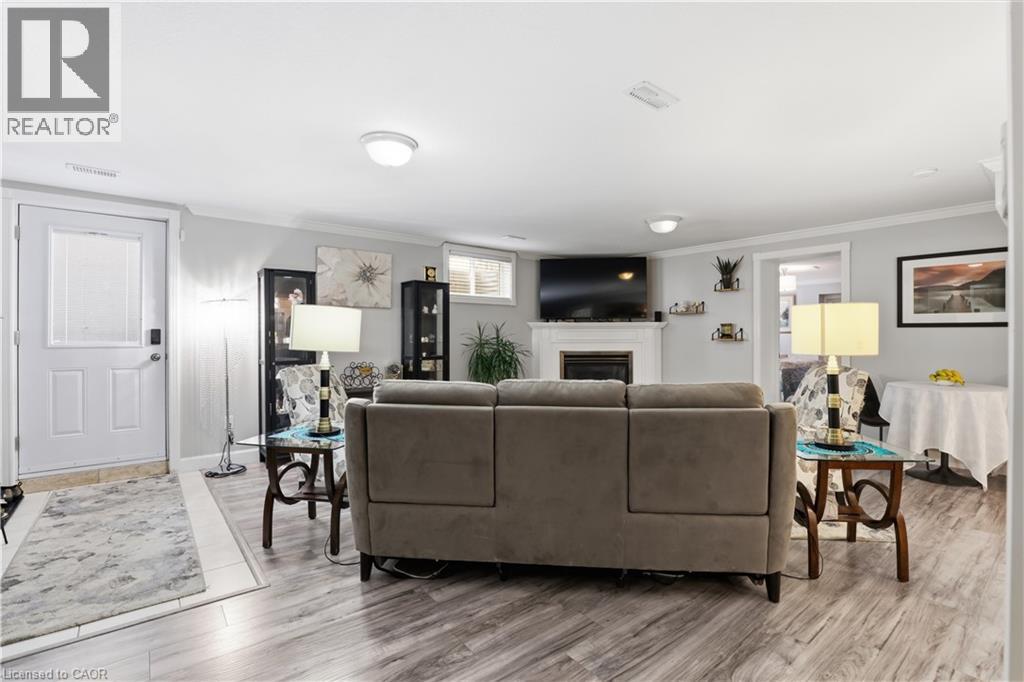 29 Chipman Avenue, Hamilton, ON - Indoor Photo Showing Living Room With Fireplace