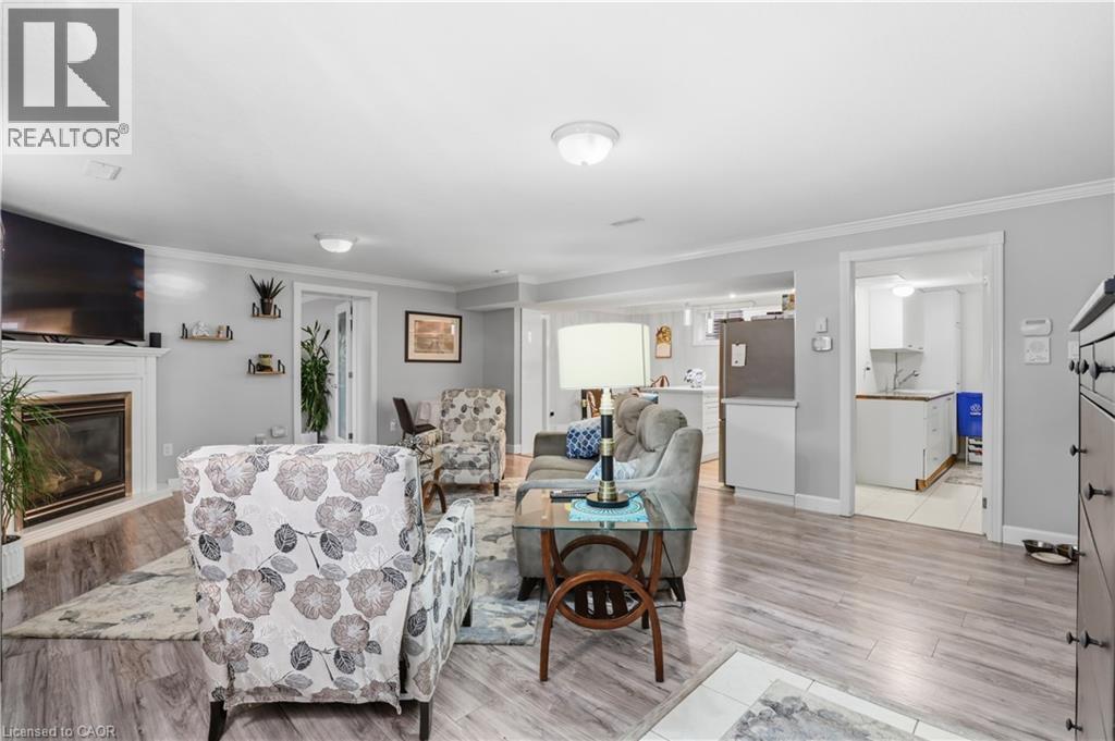 29 Chipman Avenue, Hamilton, ON - Indoor Photo Showing Living Room With Fireplace