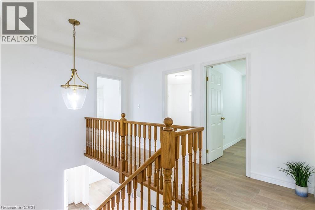 Hallway featuring an upstairs landing and light wood-style floors - 252 Thorner Drive Unit# Upper, Hamilton, ON - Indoor Photo Showing Other Room