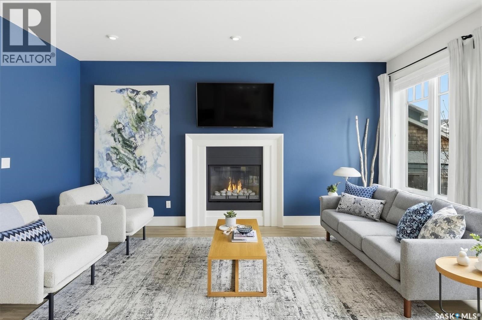203 Pritchard Terrace, Saskatoon, SK - Indoor Photo Showing Living Room With Fireplace