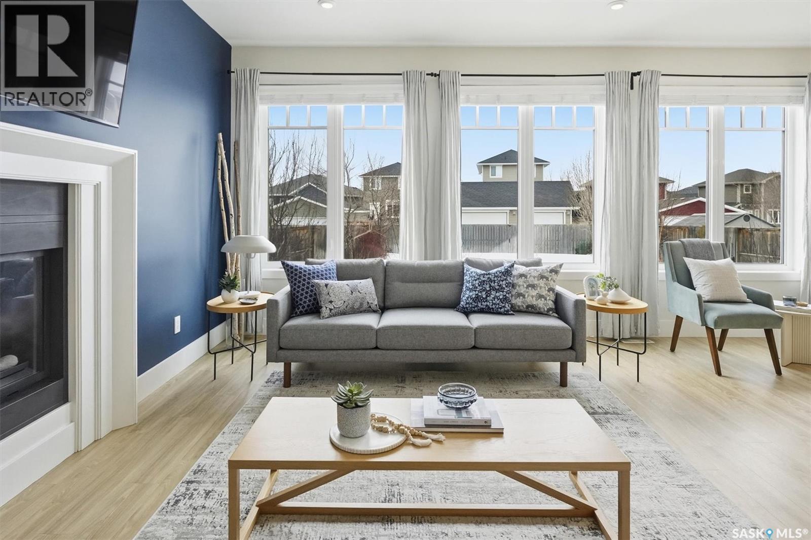 203 Pritchard Terrace, Saskatoon, SK - Indoor Photo Showing Living Room With Fireplace