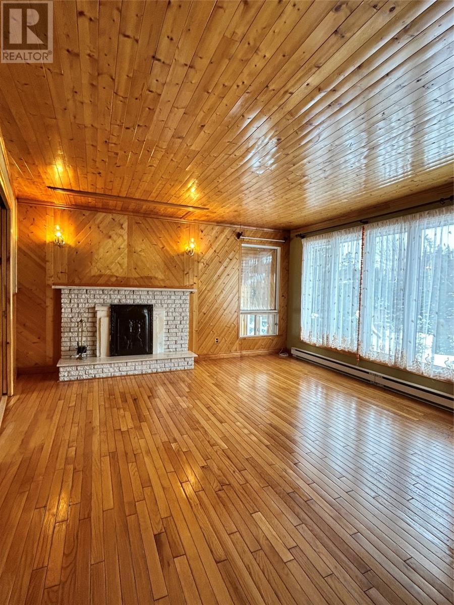 8 Cod Seine Road, Mobile, NL - Indoor With Fireplace