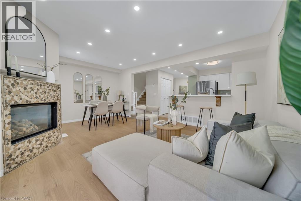 540 Mariner Drive, Waterloo, ON - Indoor Photo Showing Living Room With Fireplace