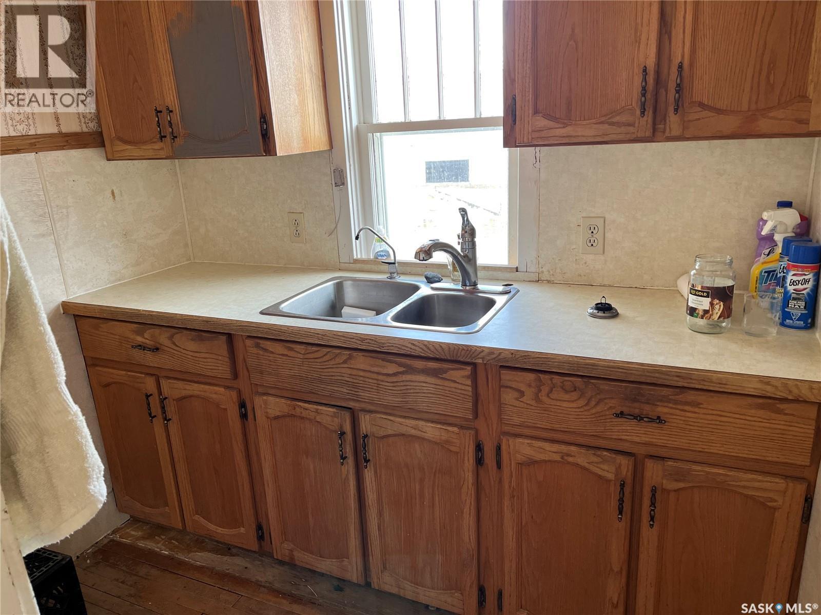 133 2Nd Street E, Lafleche, SK - Indoor Photo Showing Kitchen With Double Sink