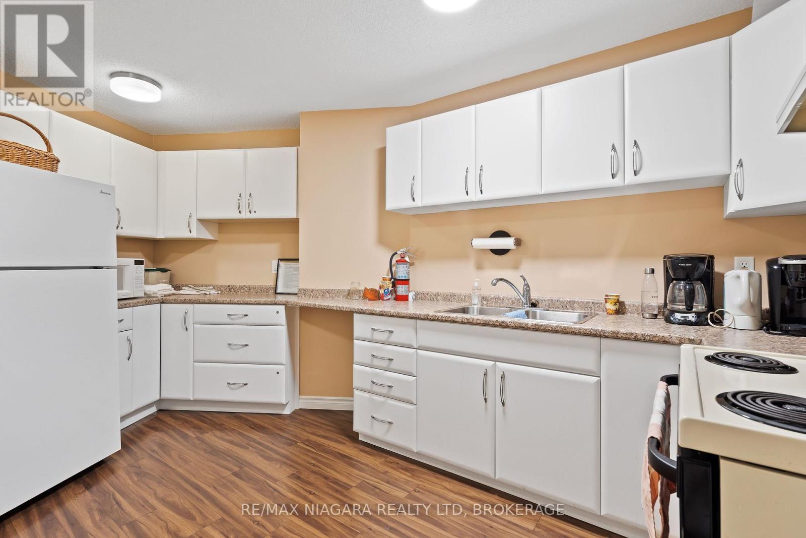 Full event kitchen for use! - 502 - 7 Gale Crescent, St. Catharines (E. Chester), ON - Indoor Photo Showing Kitchen With Double Sink