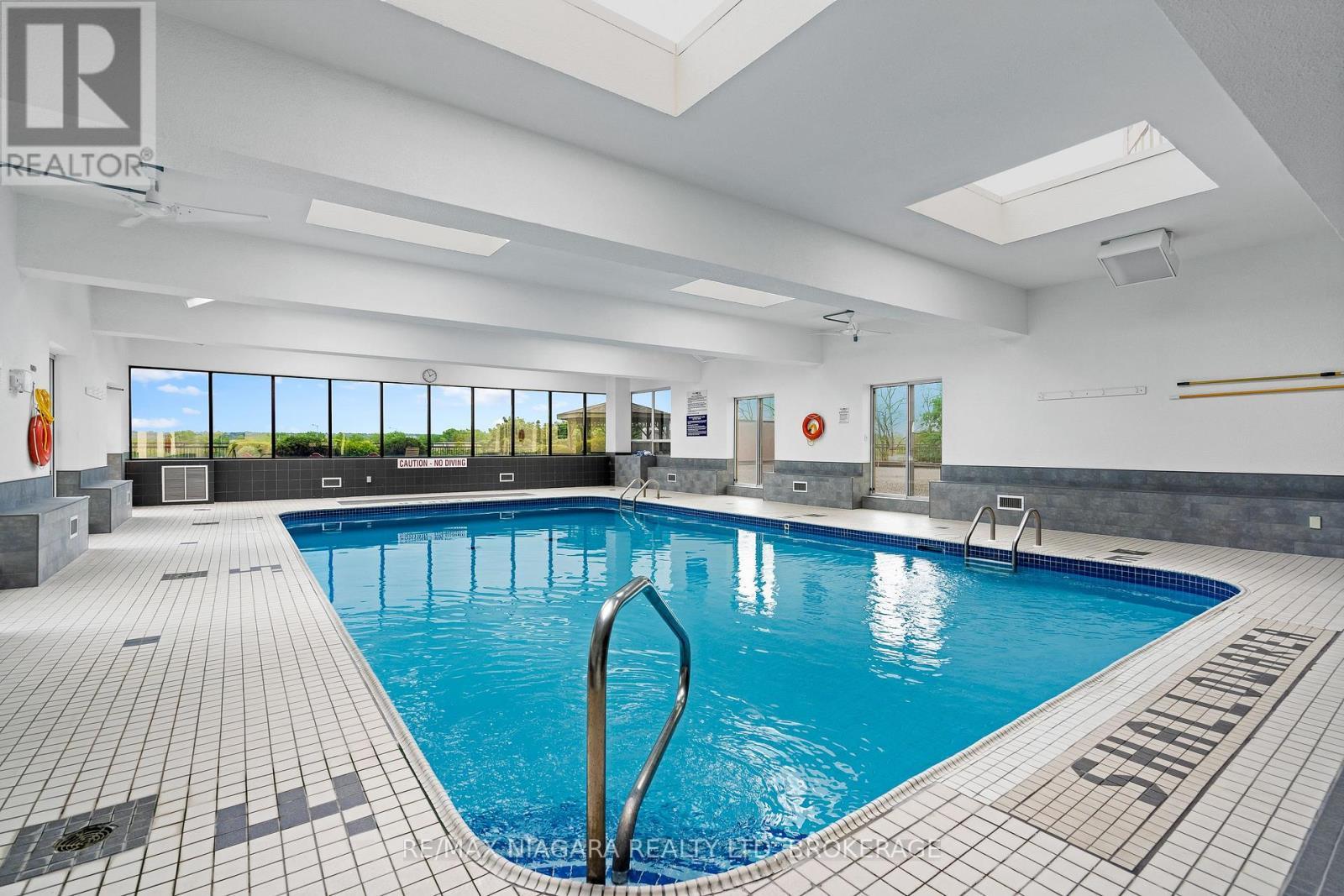 502 - 7 Gale Crescent, St. Catharines (E. Chester), ON - Indoor Photo Showing Other Room With In Ground Pool