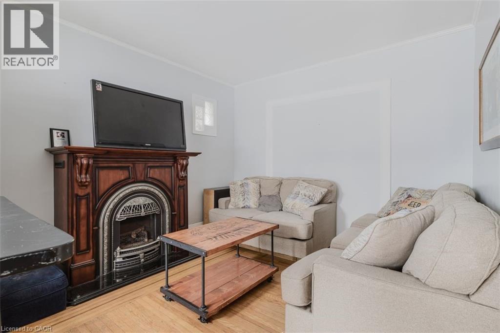 84 South Oval, Hamilton, ON - Indoor Photo Showing Living Room With Fireplace