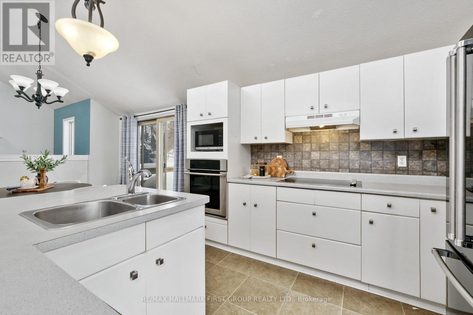 110 Davis Road, Alnwick/Haldimand, ON - Indoor Photo Showing Kitchen With Double Sink