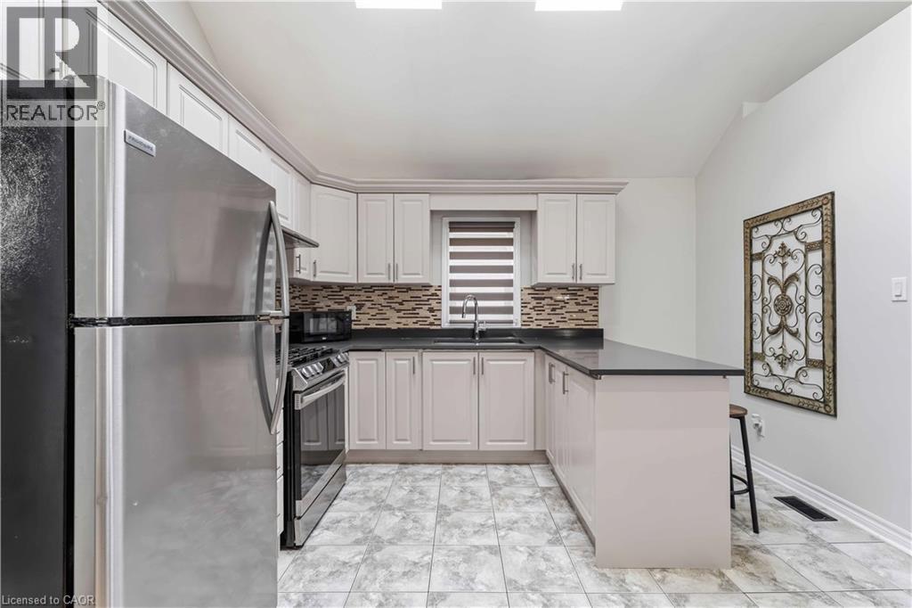 74 Province Street N, Hamilton, ON - Indoor Photo Showing Kitchen With Stainless Steel Kitchen