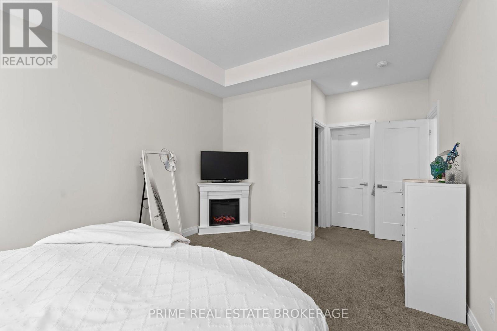 15 Compass Trail, Central Elgin, ON - Indoor Photo Showing Bedroom