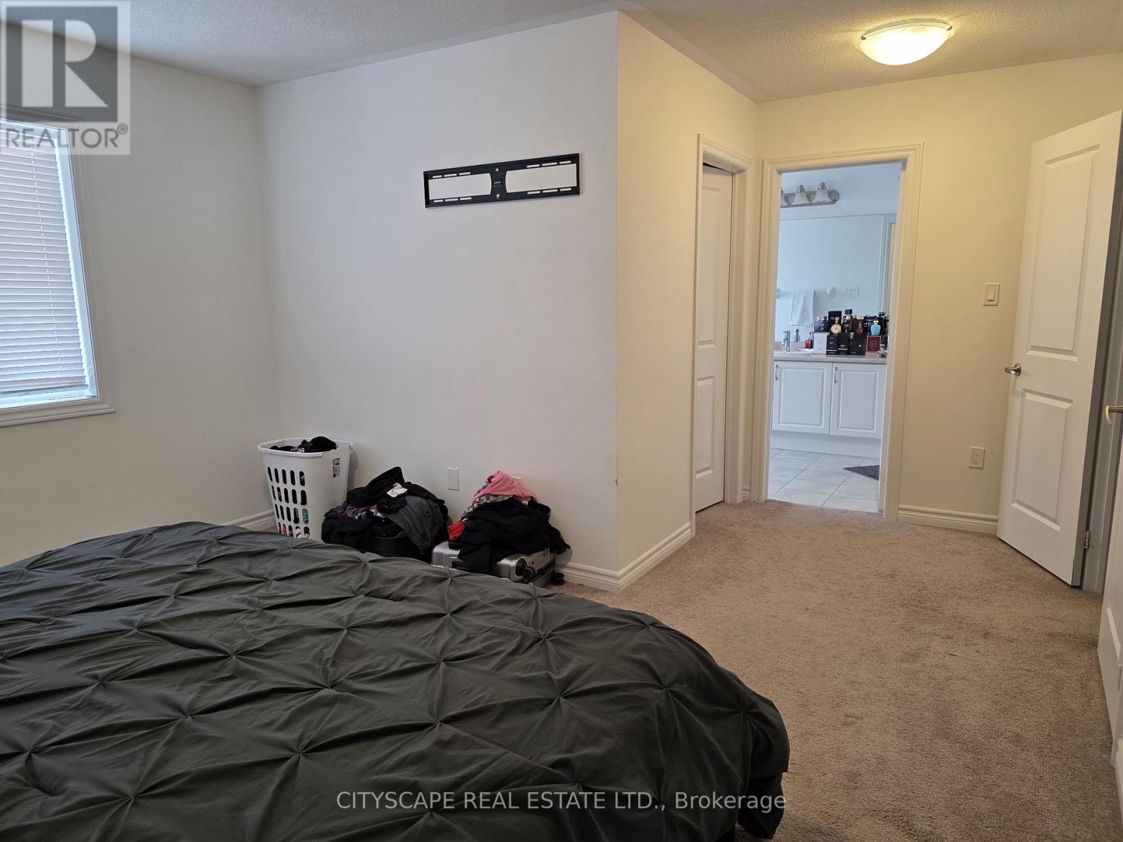 Primary Bedroom + Walk In Closet + 4pc Ensuite - 351 Ridley Crescent, Southgate, ON - Indoor Photo Showing Bedroom