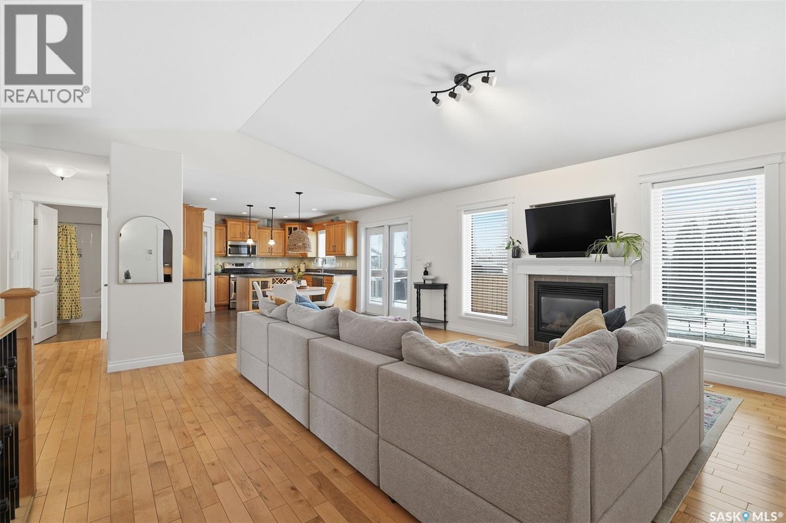 12 Longpre Crescent, Prince Albert, SK - Indoor Photo Showing Living Room With Fireplace