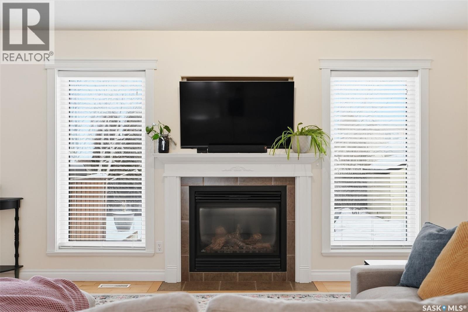 12 Longpre Crescent, Prince Albert, SK - Indoor Photo Showing Living Room With Fireplace