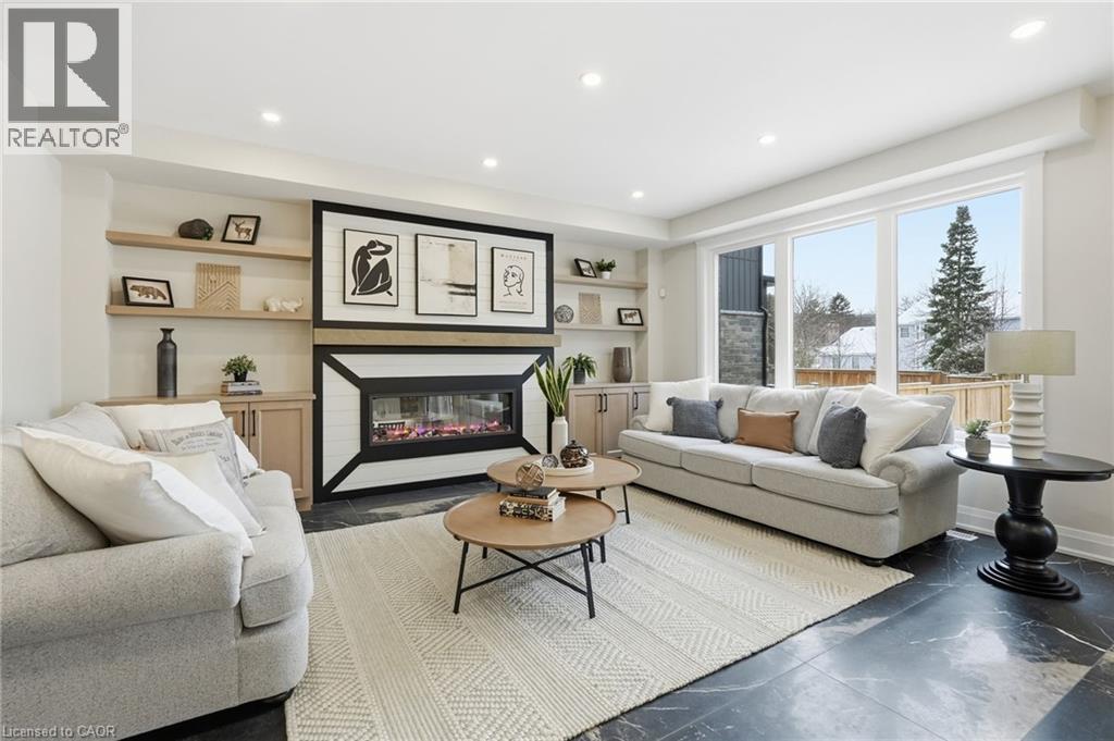 7 Bartlett Avenue, Grimsby, ON - Indoor Photo Showing Living Room With Fireplace
