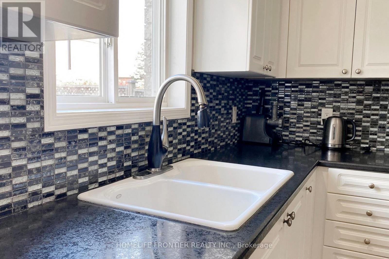 48 Patrick Drive S, Barrie, ON - Indoor Photo Showing Kitchen With Double Sink