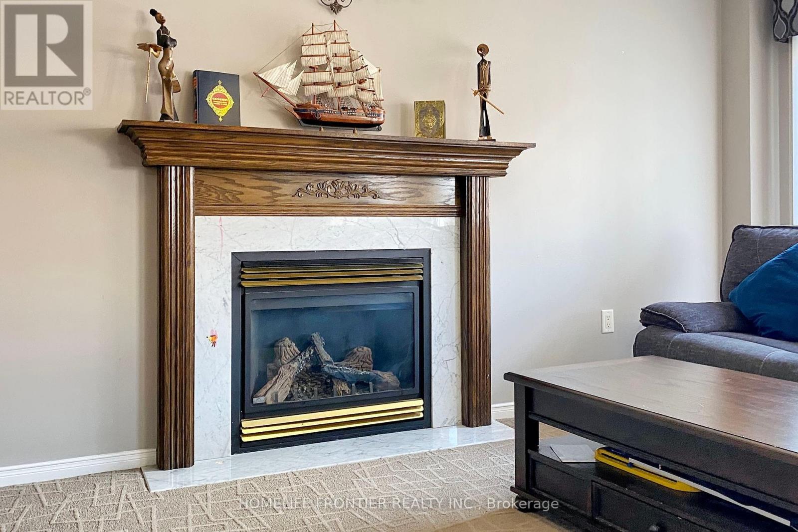 48 Patrick Drive S, Barrie, ON - Indoor Photo Showing Living Room With Fireplace