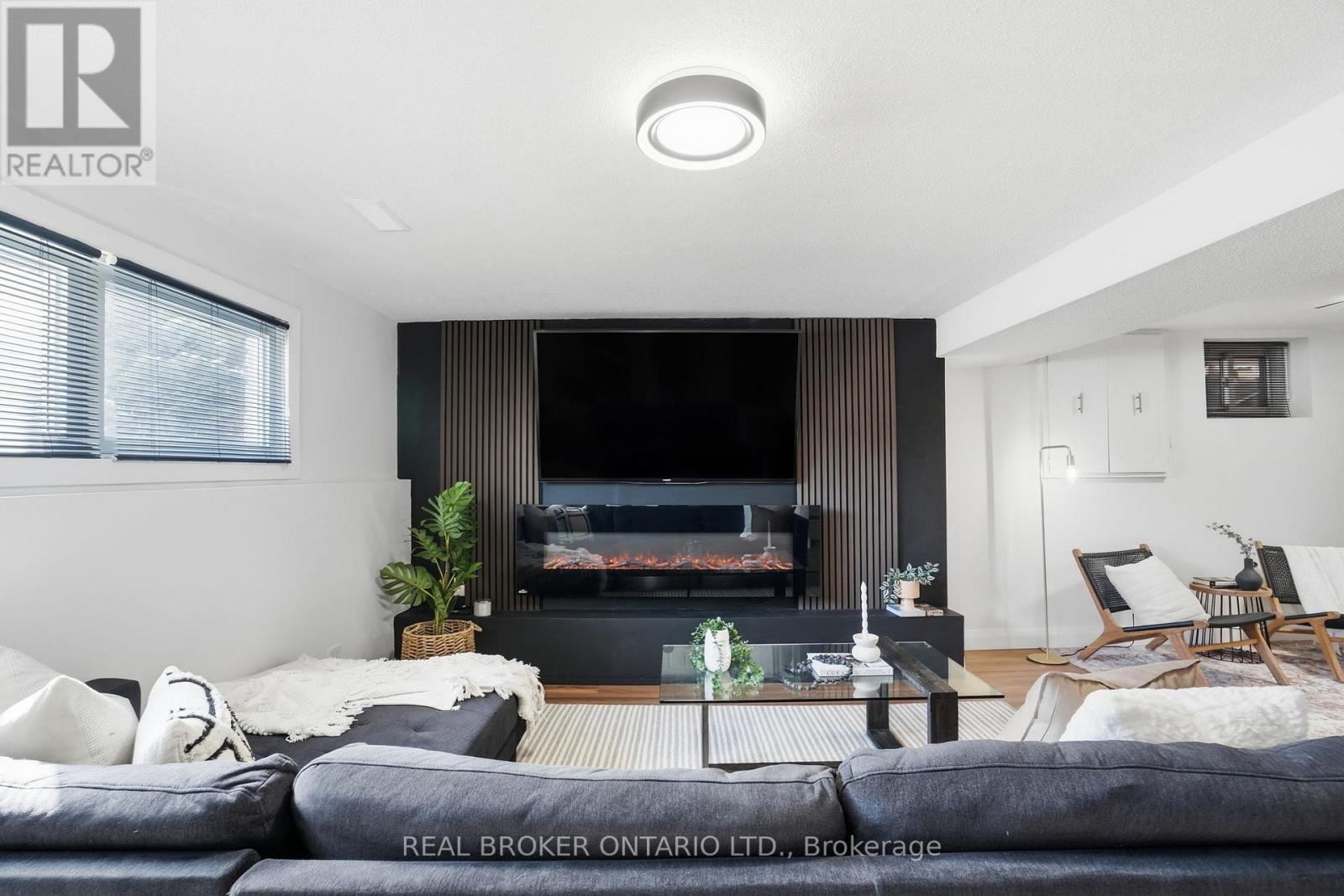 14 Basin Crescent, Hamilton, ON - Indoor Photo Showing Living Room With Fireplace