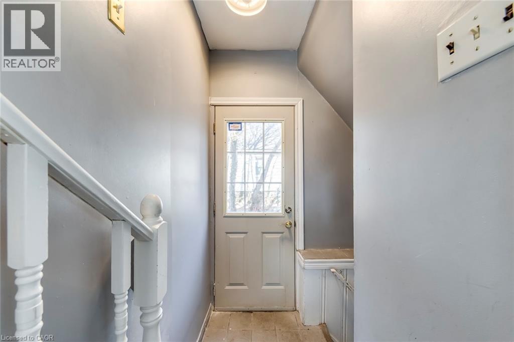 Doorway to outside featuring lofted ceiling - 142 Ewen Road, Hamilton, ON - Indoor Photo Showing Other Room