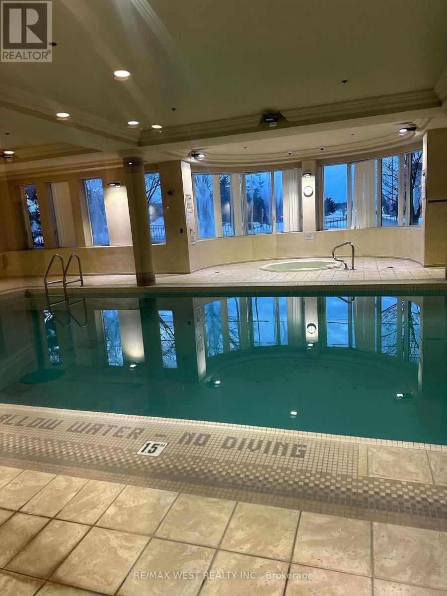 909 - 4850 Glen Erin Drive, Mississauga, ON - Indoor Photo Showing Other Room With In Ground Pool