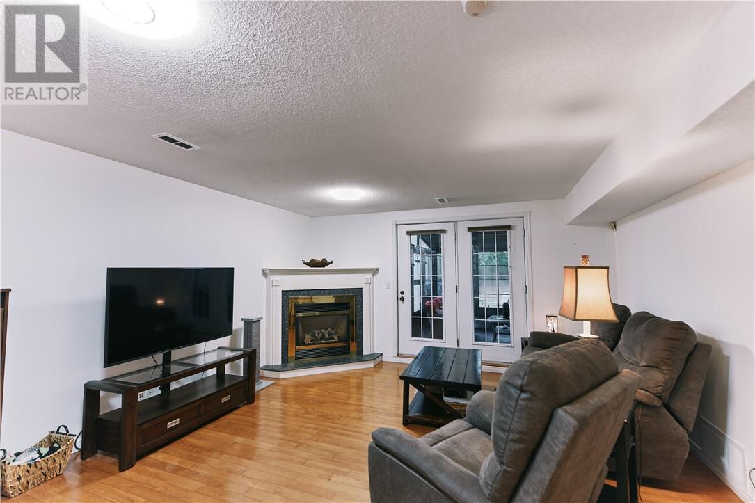 2779 Algonquin, Sudbury, ON - Indoor Photo Showing Living Room With Fireplace