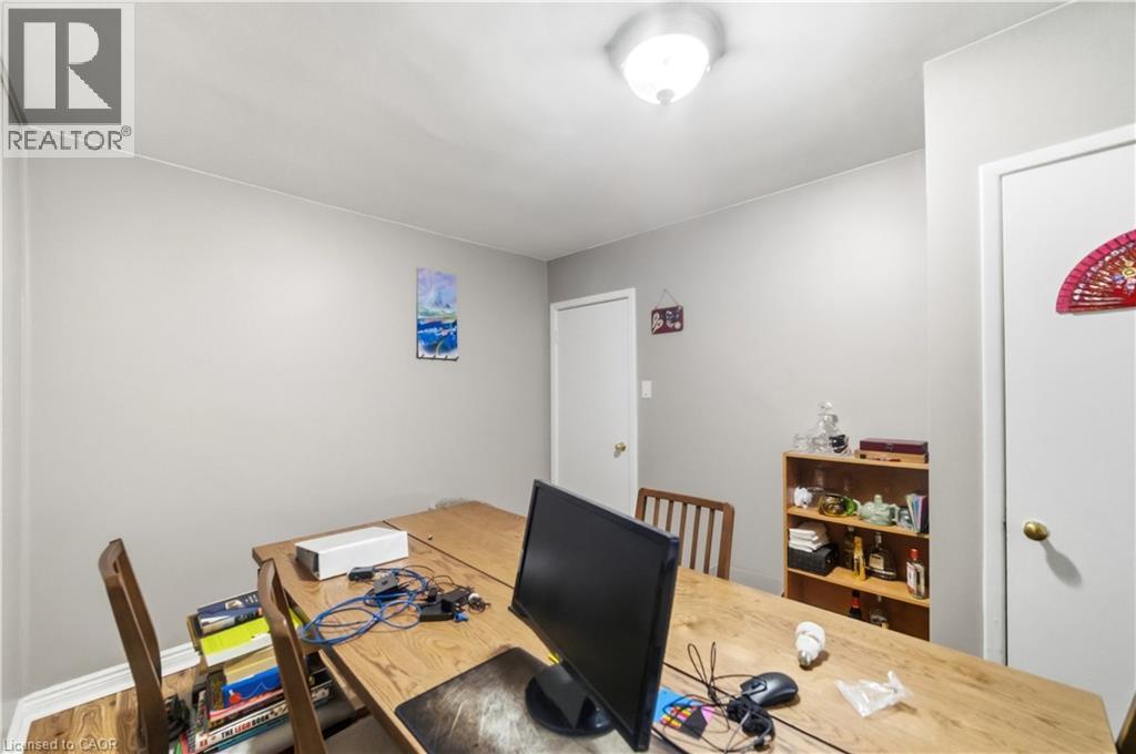 Dining space featuring an office area and wood finished floors - 776 Britannia Avenue, Hamilton, ON - Indoor