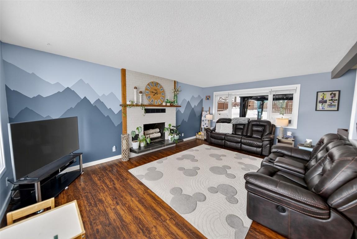 209 14Th Street, Cranbrook, BC - Indoor Photo Showing Living Room With Fireplace