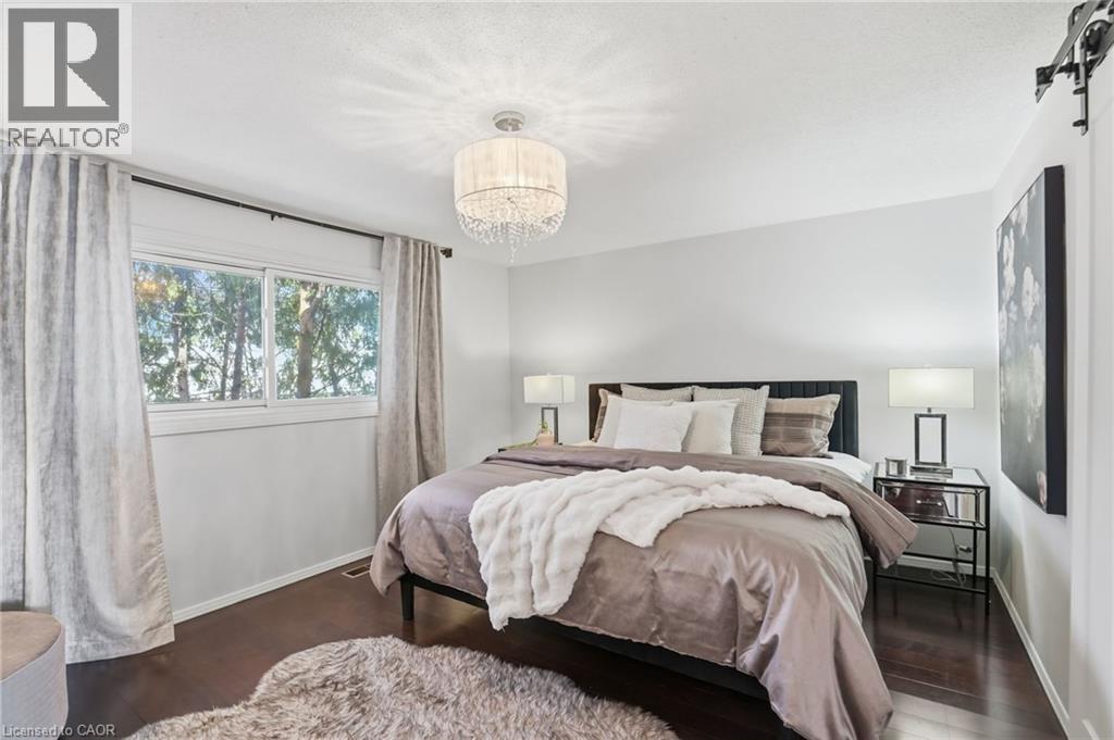 Primary Bedroom with hardwood floors - 14 Basin Crescent, Hamilton, ON - Indoor Photo Showing Bedroom