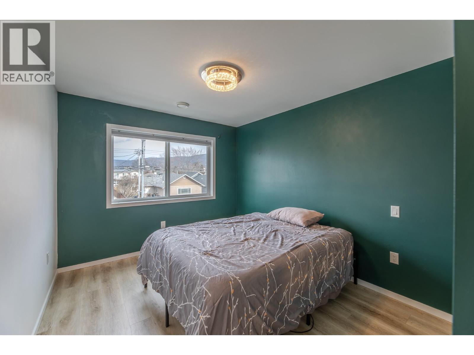490 Eckhardt Avenue Unit# 101, Penticton, BC - Indoor Photo Showing Bedroom