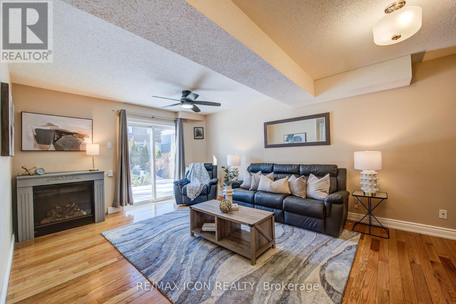 84 Endeavour Drive, Cambridge, ON - Indoor Photo Showing Living Room With Fireplace