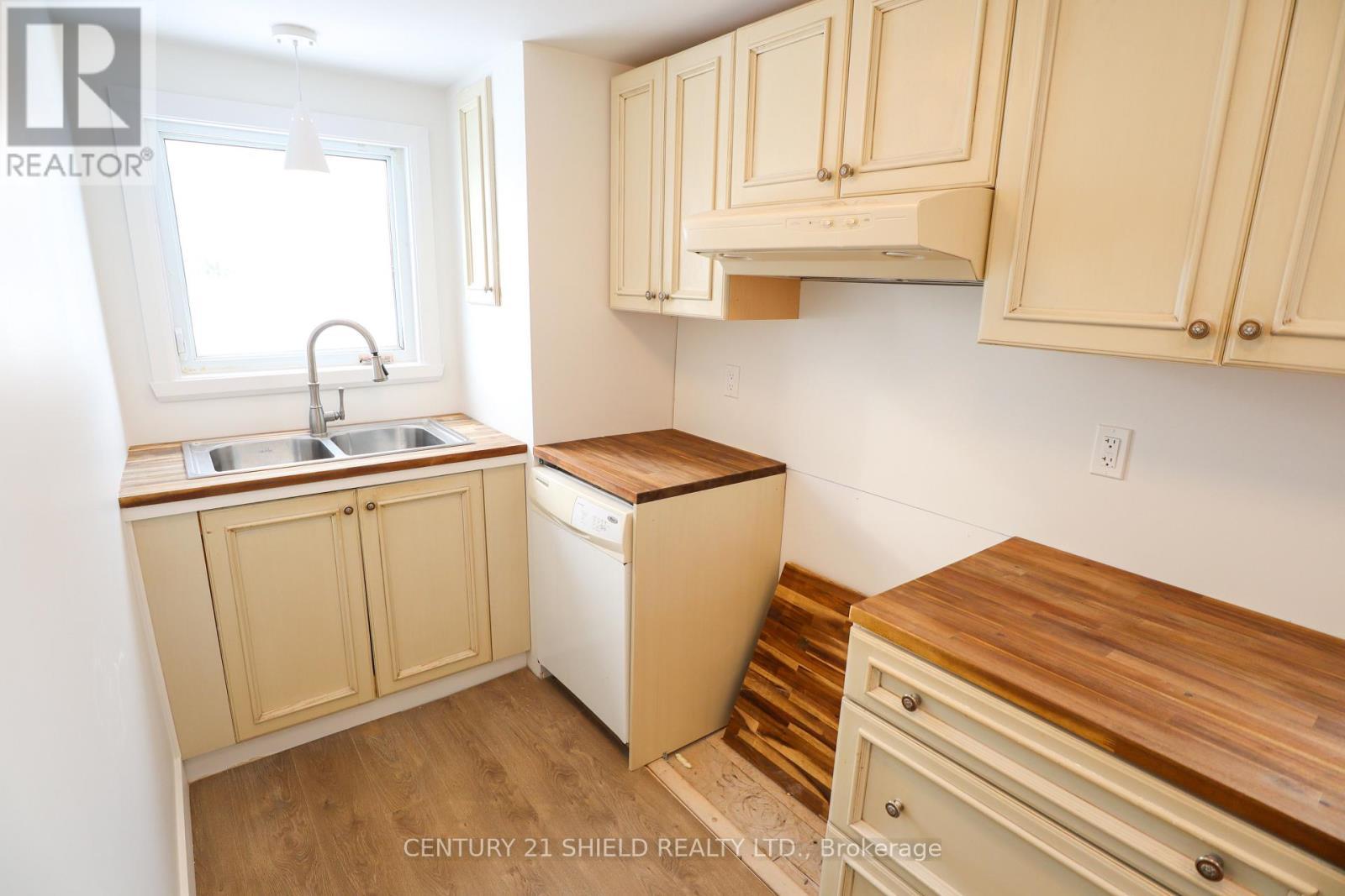 143 Carleton Street, Cornwall, ON - Indoor Photo Showing Kitchen With Double Sink