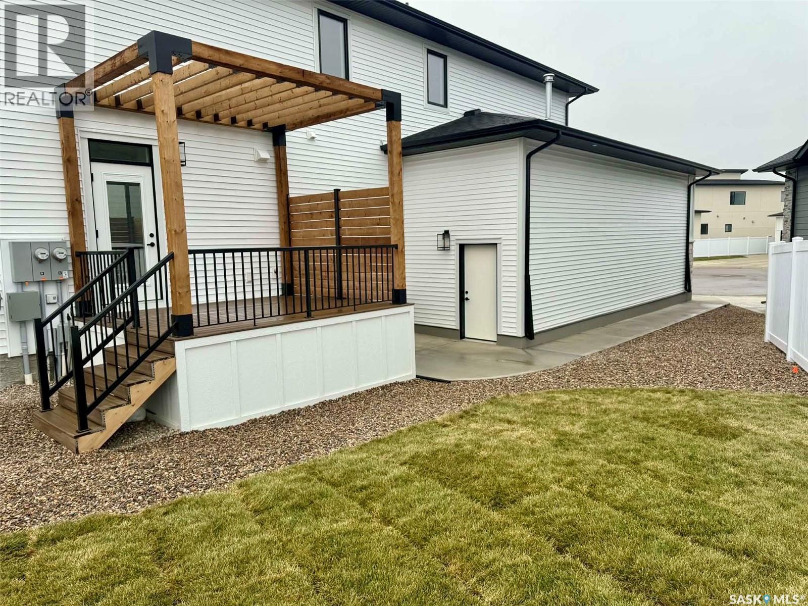 327 Woolf Bay, Saskatoon, SK - Outdoor With Deck Patio Veranda With Exterior