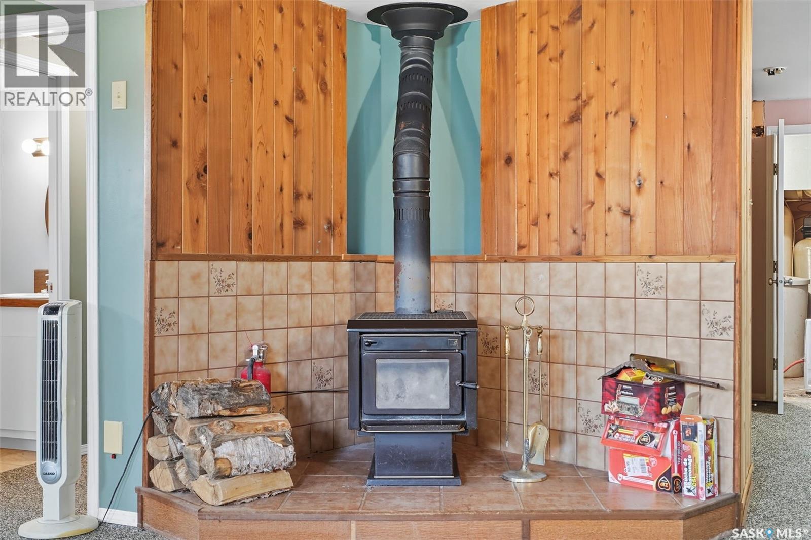 Deneiko Acreage, Usborne Rm No. 310, SK - Indoor Photo Showing Other Room With Fireplace