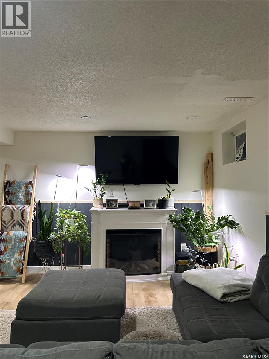 816 8Th Avenue, Rosthern, SK - Indoor Photo Showing Living Room With Fireplace