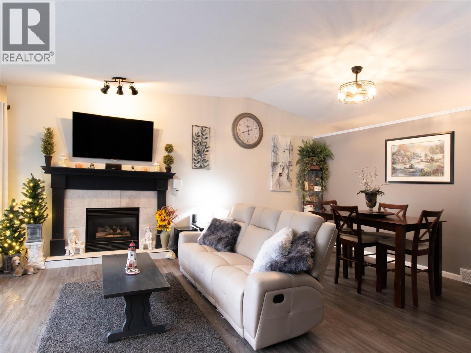 2876 Juniper Crescent, Blind Bay, BC - Indoor Photo Showing Living Room With Fireplace