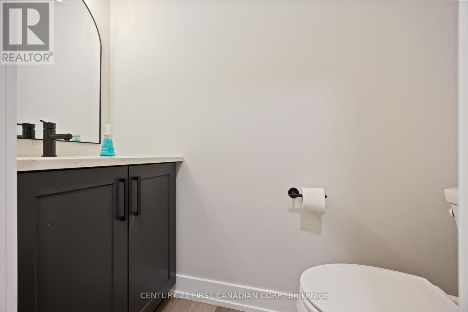 Main Floor - 2pc Powder Room - 656 Ketter Way, Plympton-Wyoming (Plympton Wyoming), ON - Indoor Photo Showing Bathroom