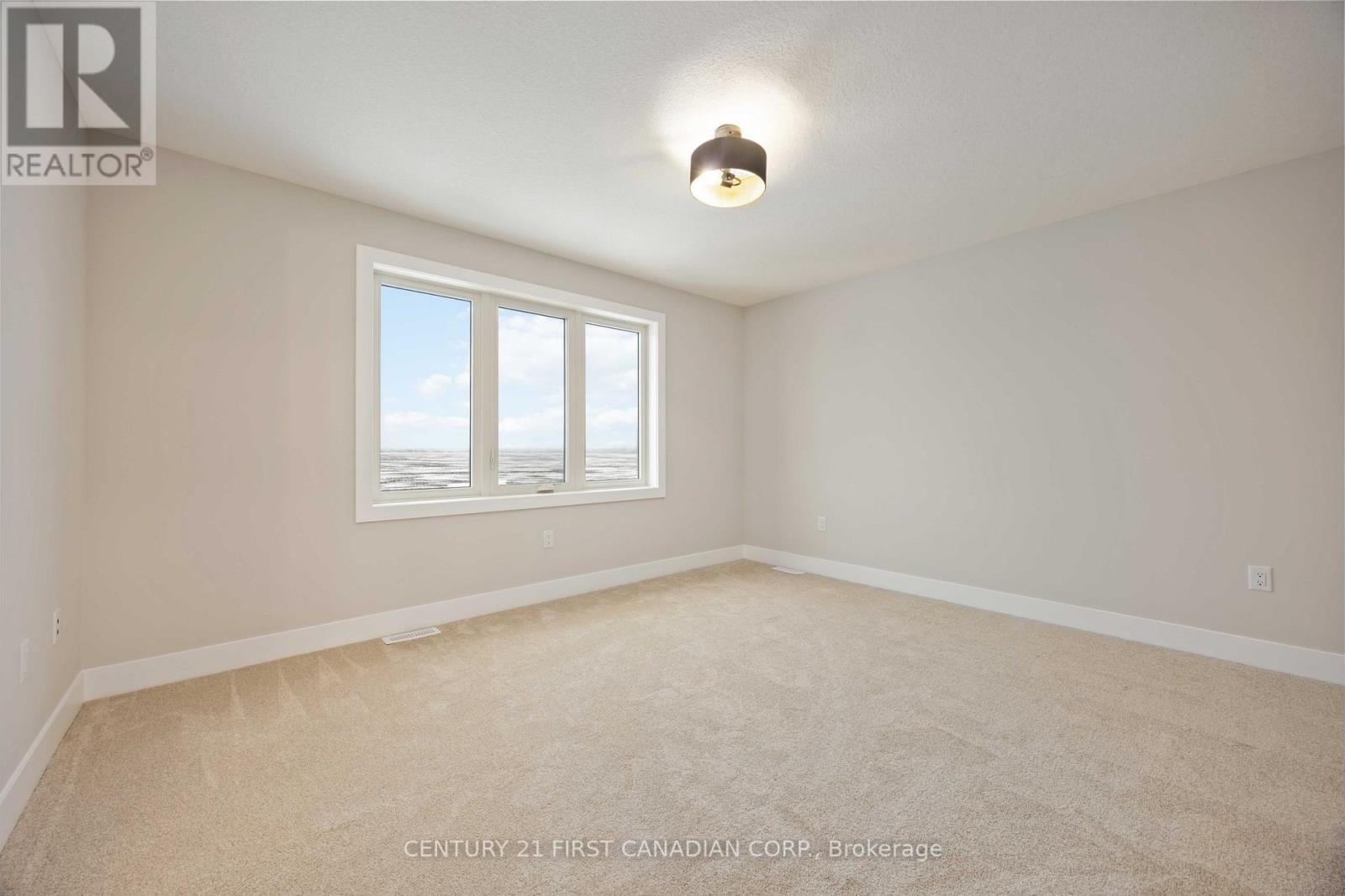 Primary Bedroom - 656 Ketter Way, Plympton-Wyoming (Plympton Wyoming), ON - Indoor Photo Showing Other Room