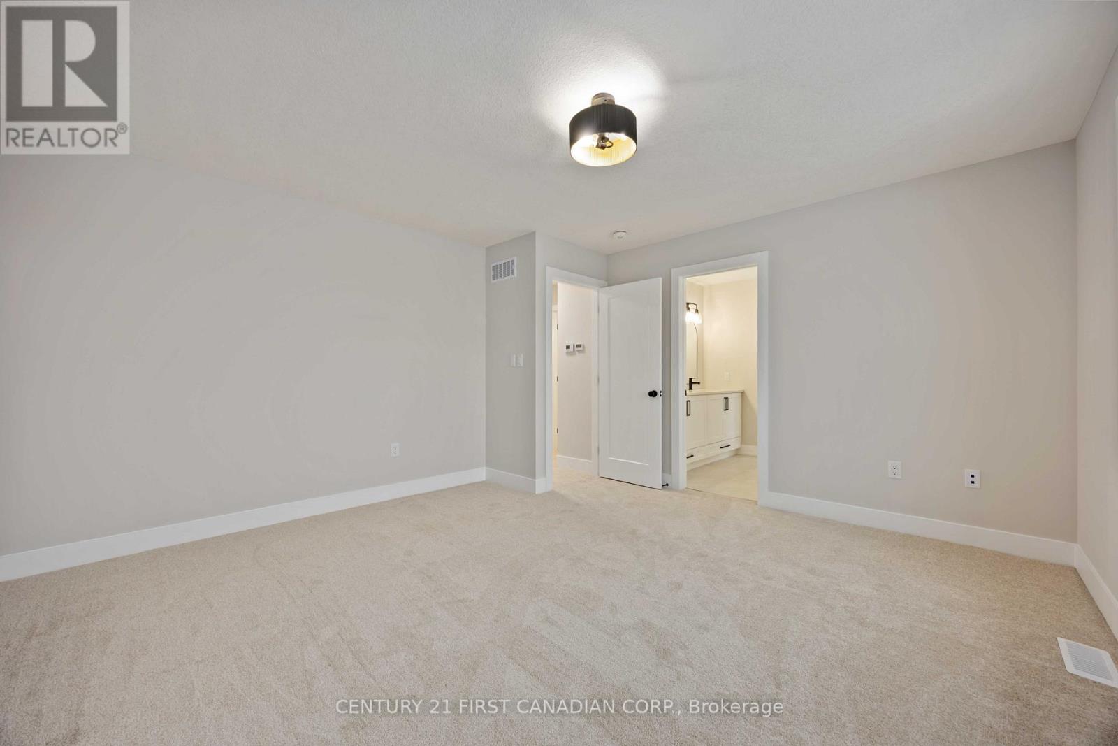 Primary Bedroom - 656 Ketter Way, Plympton-Wyoming (Plympton Wyoming), ON - Indoor Photo Showing Other Room