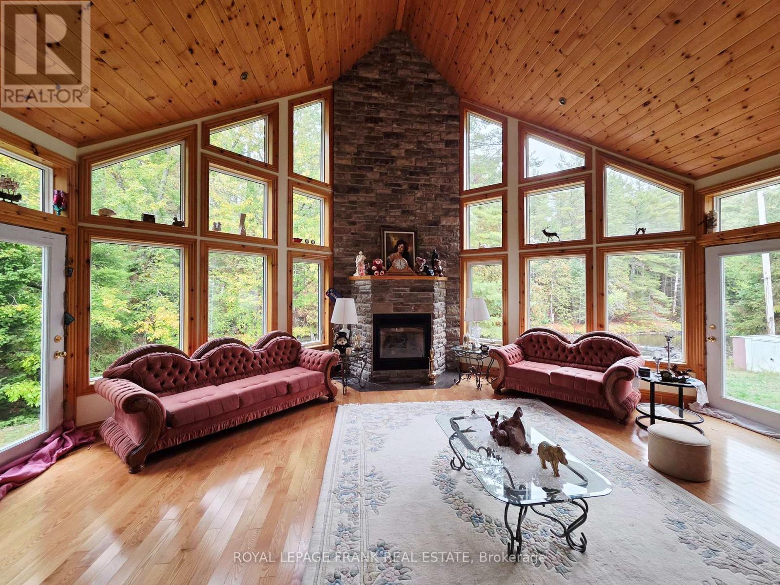8847 Highway 28, North Kawartha, ON - Indoor Photo Showing Living Room With Fireplace