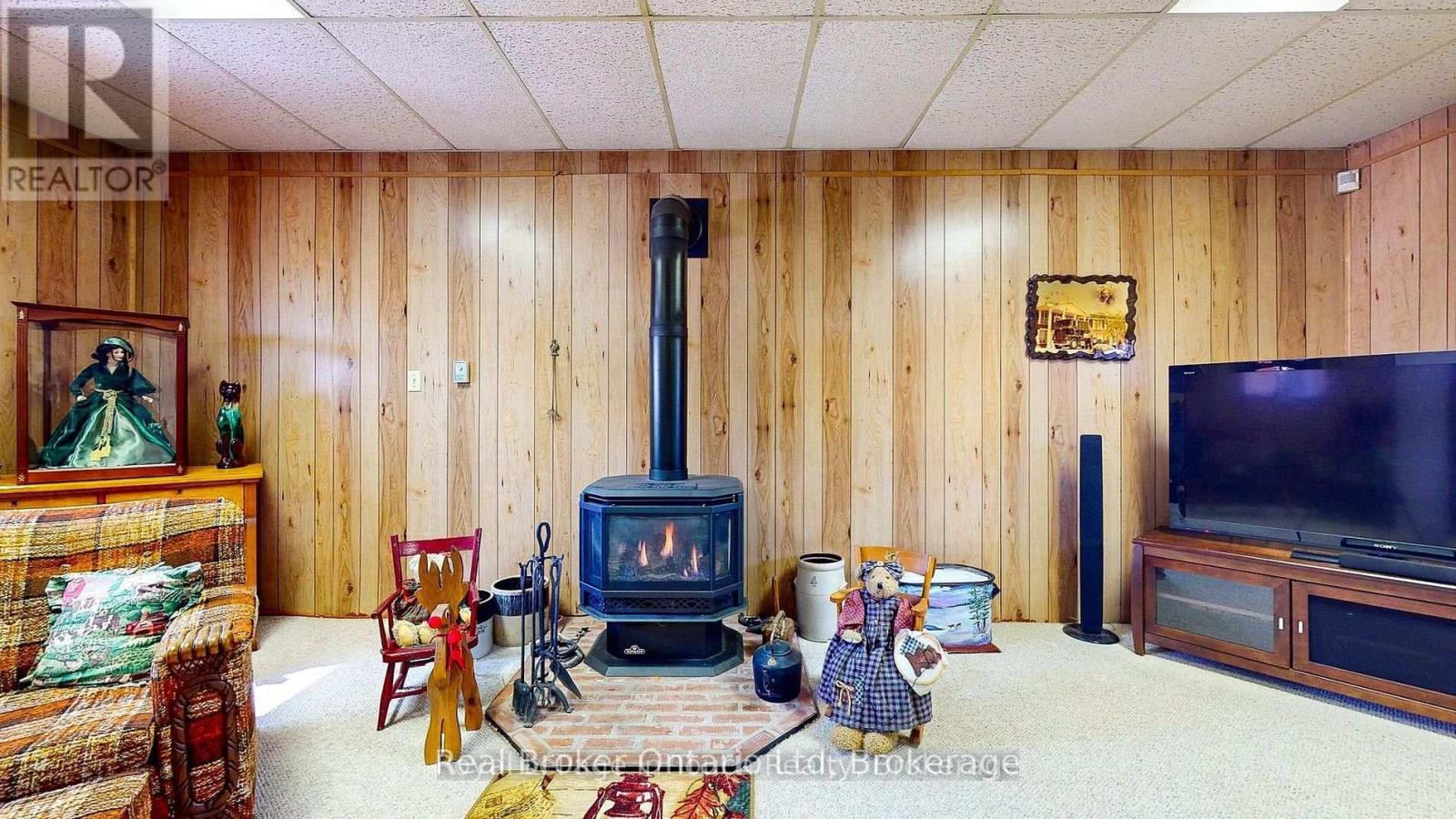 14 Seneca Crescent, Tiny, ON - Indoor With Fireplace