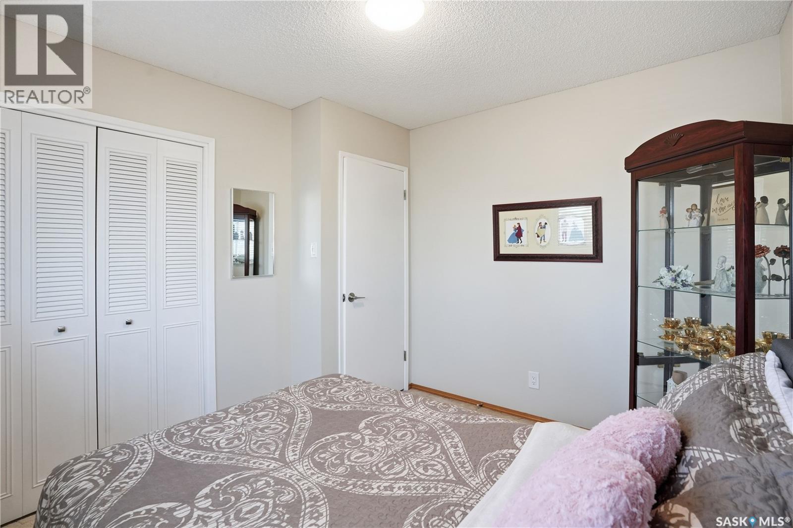 219 Sunset Drive, Regina, SK - Indoor Photo Showing Bedroom