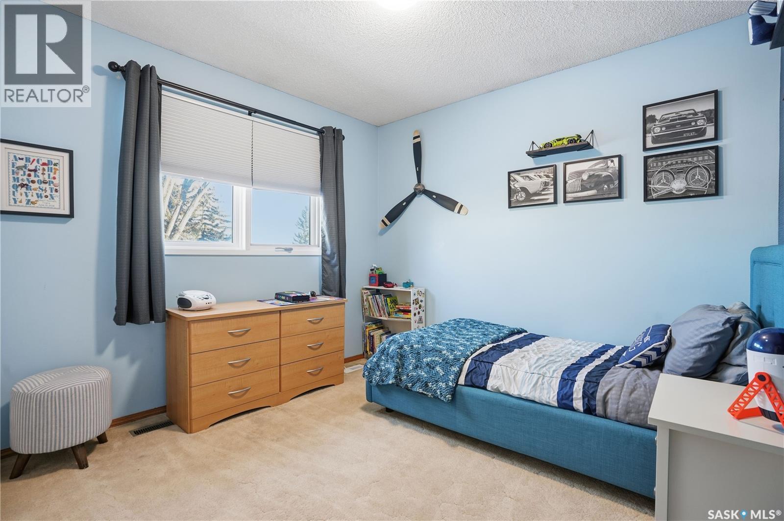 219 Sunset Drive, Regina, SK - Indoor Photo Showing Bedroom