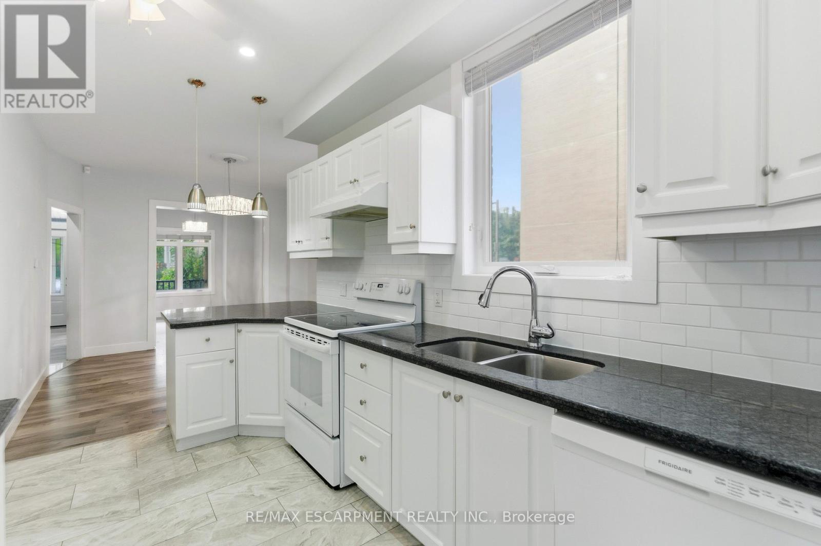 199 Jackson Street E, Hamilton, ON - Indoor Photo Showing Kitchen With Double Sink