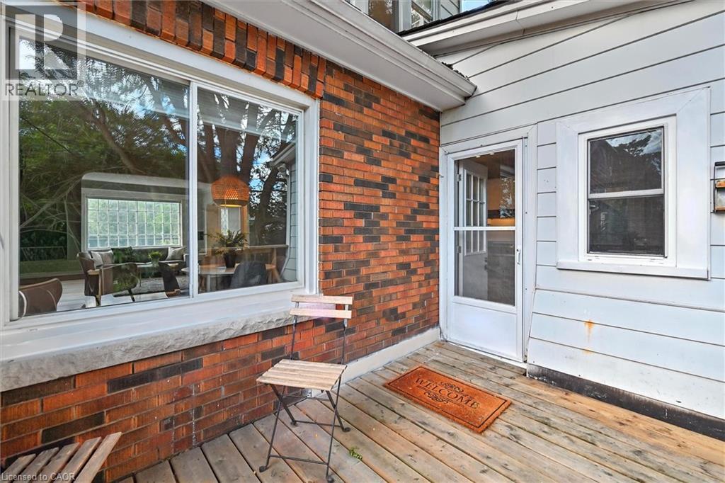 View of wooden deck - 1047 Main Street E, Hamilton, ON - Outdoor With Deck Patio Veranda With Exterior