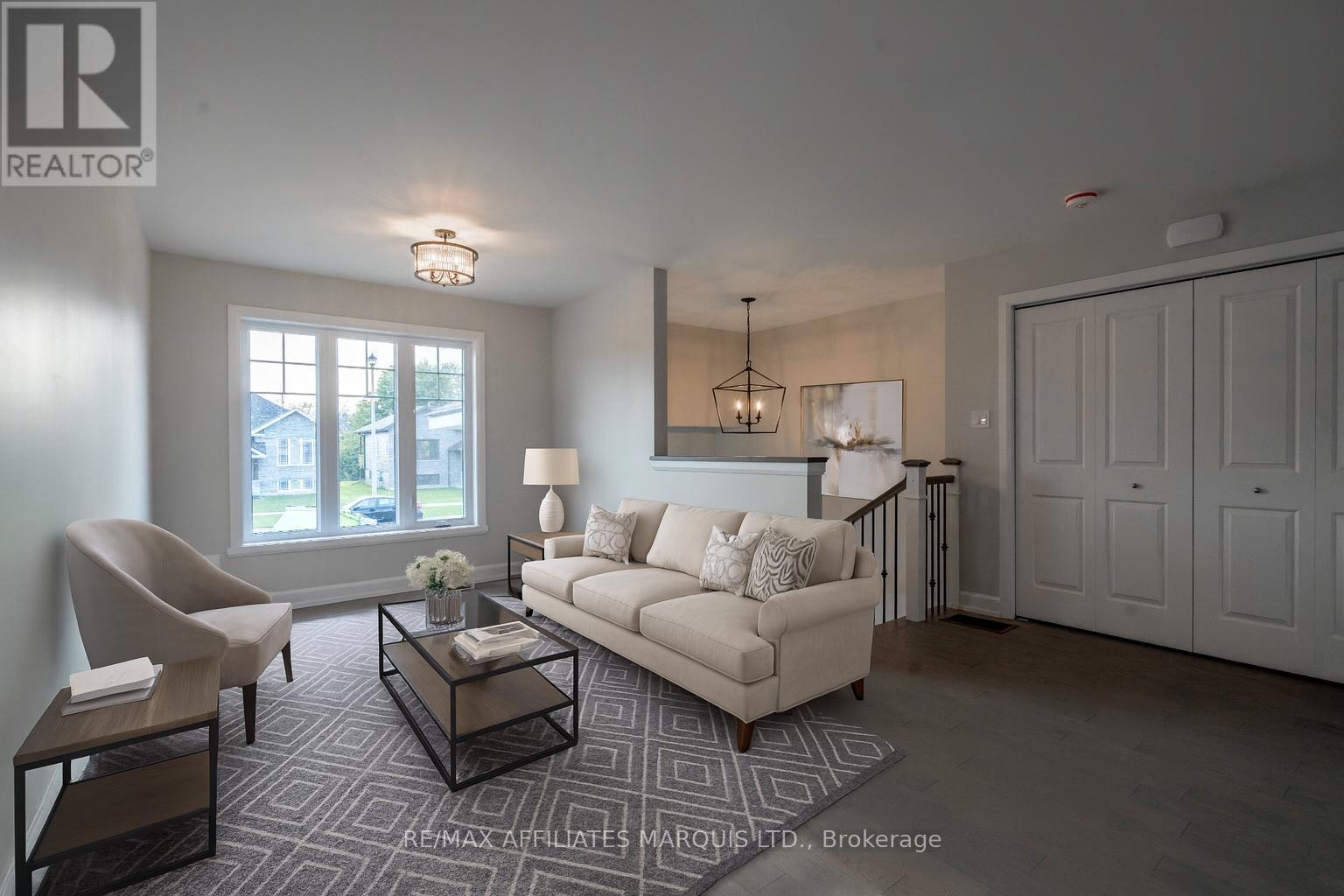 Virtually staged - 100 Woodland Drive, Cornwall, ON - Indoor Photo Showing Living Room