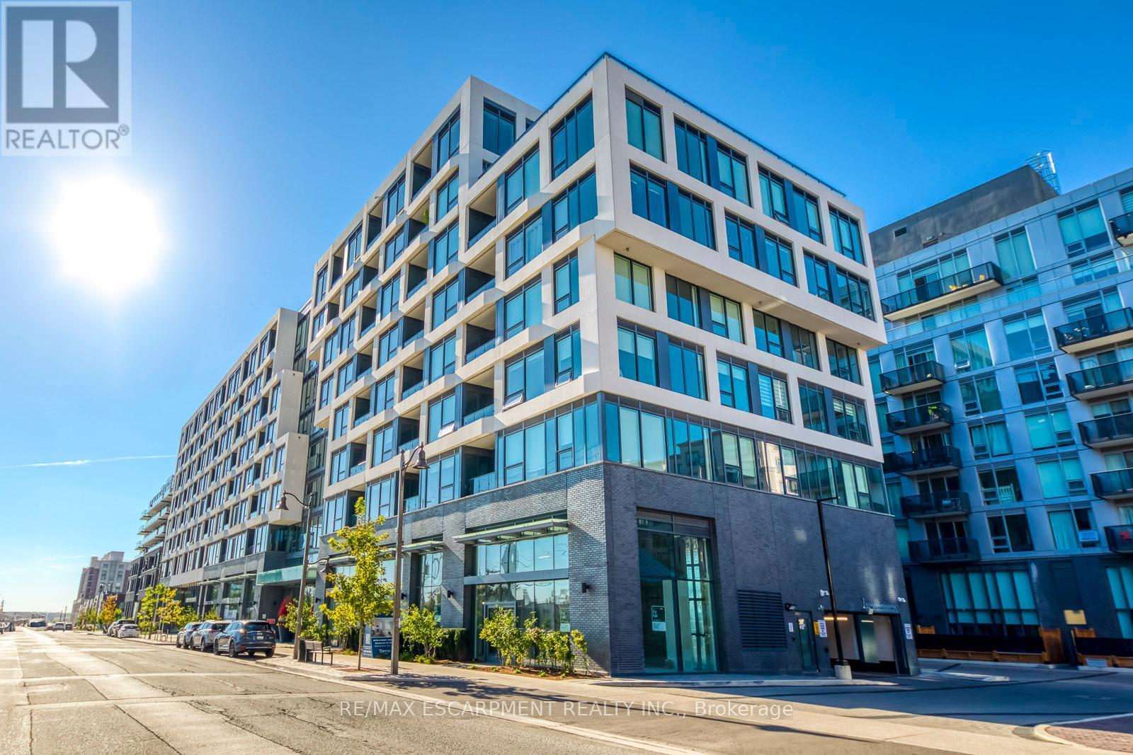 112 - 2450 Old Bronte Road, Oakville, ON - Outdoor With Facade